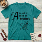 Ask and It Shall Be Fetched Chihuahua T-Shirt flat lay in Jade Dome, featuring a sparse pen-and-ink illustration of a Chihuahua at a proud trot carrying an oversized fig leaf.