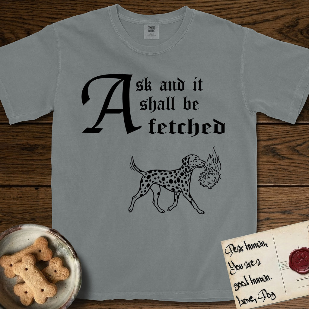 Ask and It Shall Be Fetched Dalmatian T-Shirt flat lay in Granite, featuring a sparse pen-and-ink illustration of a Dalmatian at a proud trot carrying a small burning bush.