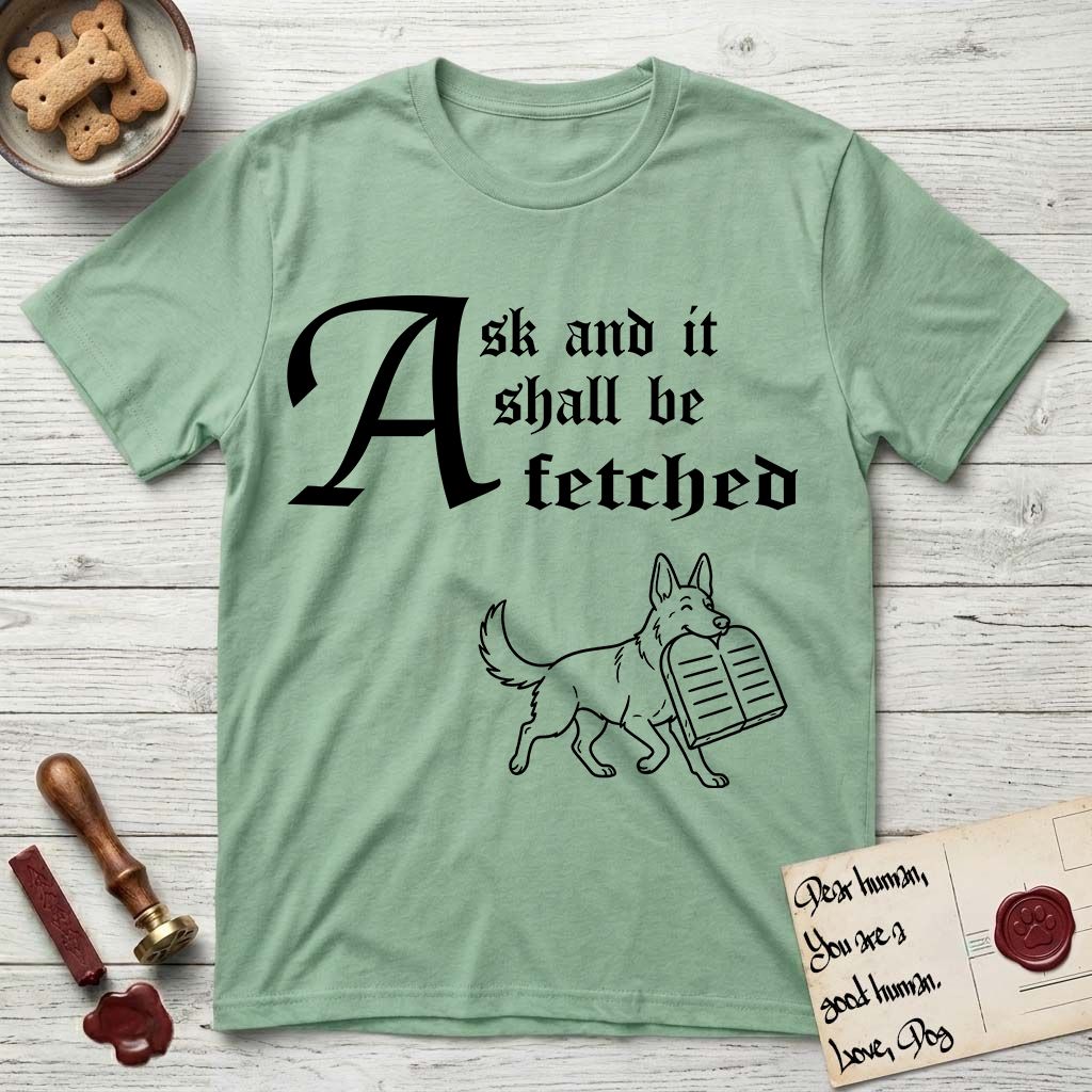 Ask and It Shall Be Fetched German Shepherd T-Shirt flat lay in Mint Green, featuring a sparse pen-and-ink illustration of a German Shepherd at a proud trot carrying a pair of stone tablets.