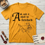 Ask and It Shall Be Fetched Pitbull T-Shirt flat lay in Gold, featuring a sparse pen-and-ink illustration of a Pitbull at a proud trot carrying a baby in a reed basket.
