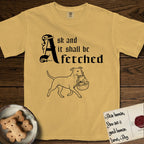 Ask and It Shall Be Fetched Pitbull T-Shirt flat lay in Mustard, featuring a sparse pen-and-ink illustration of a Pitbull at a proud trot carrying a baby in a reed basket.