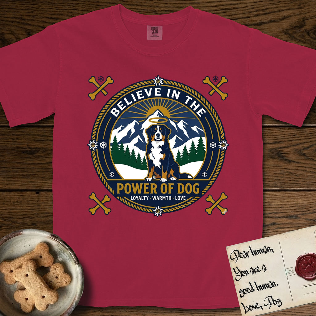 Believe in the Power of Dog Bernese Mountain Dog T-Shirt flat lay in Chili, featuring a circular national-park-style badge with a haloed Bernese Mountain Dog, a mountain scene, a rope border, and the words Loyalty, Warmth, Love.