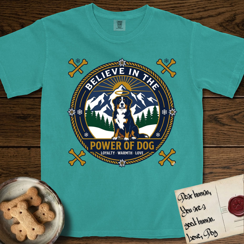 Believe in the Power of Dog Bernese Mountain Dog T-Shirt flat lay in Seafoam, featuring a circular national-park-style badge with a haloed Bernese Mountain Dog, a mountain scene, a rope border, and the words Loyalty, Warmth, Love.