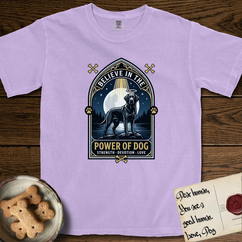 Believe in the Power of Dog Black Lab T-Shirt flat lay in Orchid, featuring a dramatic gothic-arch badge with a moonlit Black Lab on a rock above still water, a beam of light through the arch, and the words Strength, Devotion, Love.
