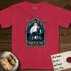 Believe in the Power of Dog Black Lab T-Shirt flat lay in Red, featuring a dramatic gothic-arch badge with a moonlit Black Lab on a rock above still water, a beam of light through the arch, and the words Strength, Devotion, Love.