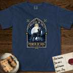 Believe in the Power of Dog Black Lab T-Shirt flat lay in True Navy, featuring a dramatic gothic-arch badge with a moonlit Black Lab on a rock above still water, a beam of light through the arch, and the words Strength, Devotion, Love.