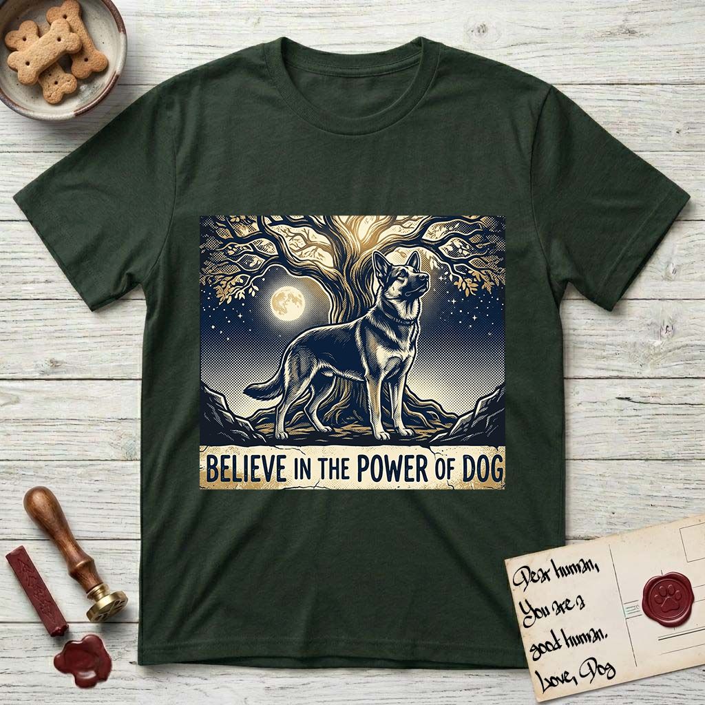 Believe in the Power of Dog German Shepherd T-Shirt flat lay in Forest Green, featuring a moonlit illustration of a German Shepherd standing beneath a great tree whose roots and branches reach equally in both directions.
