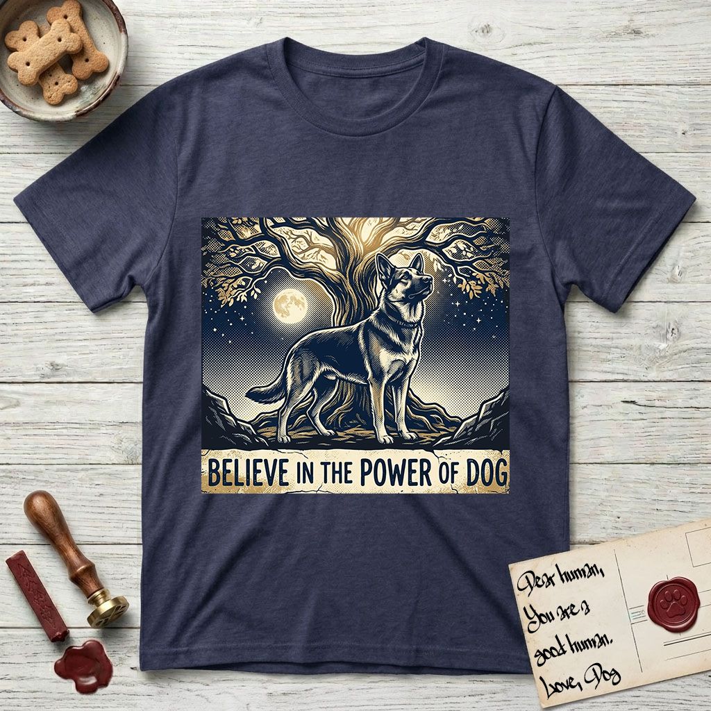 Believe in the Power of Dog German Shepherd T-Shirt flat lay in Navy, featuring a moonlit illustration of a German Shepherd standing beneath a great tree whose roots and branches reach equally in both directions.