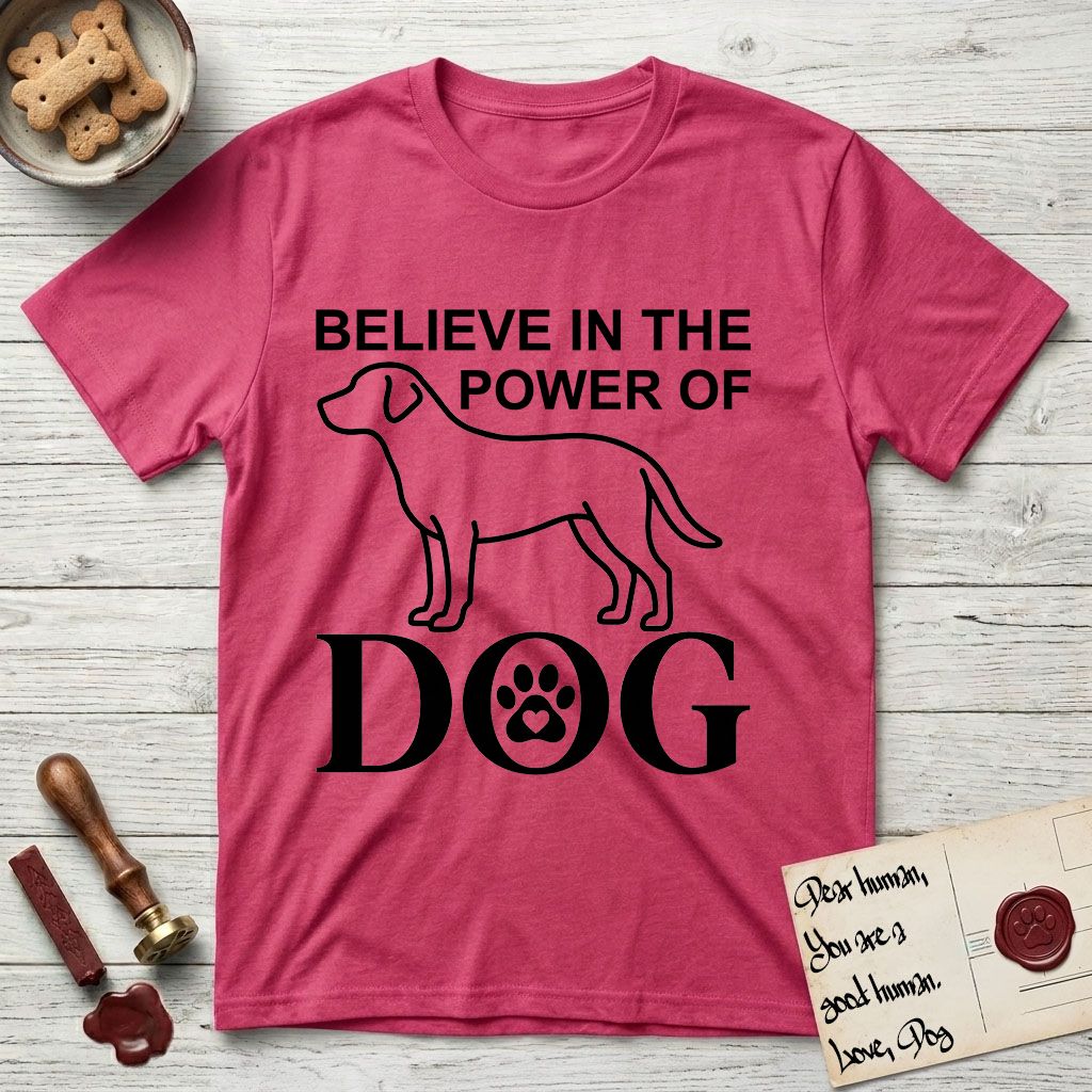 Believe in the Power of Dog Labrador T-Shirt flat lay in Heather Red, featuring stark minimalist single-line art of a Labrador with bold stacked "Believe in the Power of Dog" type and a paw-print heart in the O.
