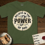 Believe in the Power of Dog Paw T-Shirt flat lay in Hemp, featuring a vintage engraving medallion of a Dog paw and a human hand meeting over crossed bones in a sunburst.