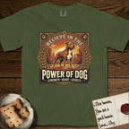 Believe in the Power of Dog Pitbull T-Shirt flat lay in Hemp, featuring a vintage urban badge with a brick-red Pitbull, a city skyline, a radiating sun, and the words Strength, Heart, Loyalty.