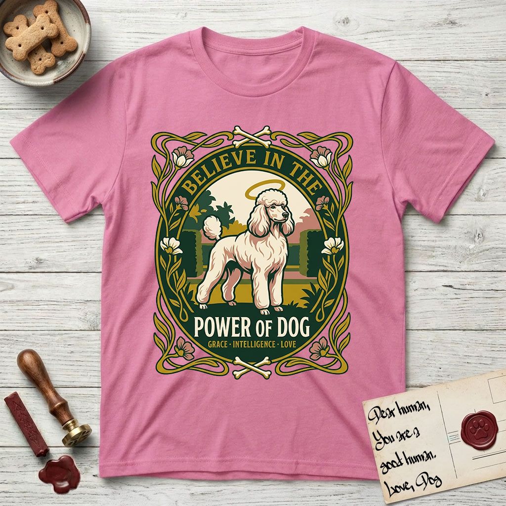 Believe in the Power of Dog Poodle T-Shirt flat lay in Azalea, featuring an Art Nouveau floral badge with a haloed Poodle in a garden park scene and the words Grace, Intelligence, Love.