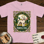 Believe in the Power of Dog Poodle T-Shirt flat lay in Blossom, featuring an Art Nouveau floral badge with a haloed Poodle in a garden park scene and the words Grace, Intelligence, Love.