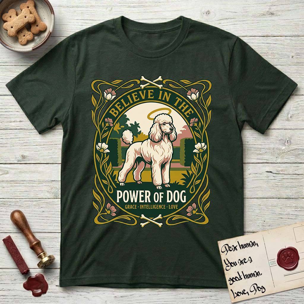 Believe in the Power of Dog Poodle T-Shirt flat lay in Forest Green, featuring an Art Nouveau floral badge with a haloed Poodle in a garden park scene and the words Grace, Intelligence, Love.