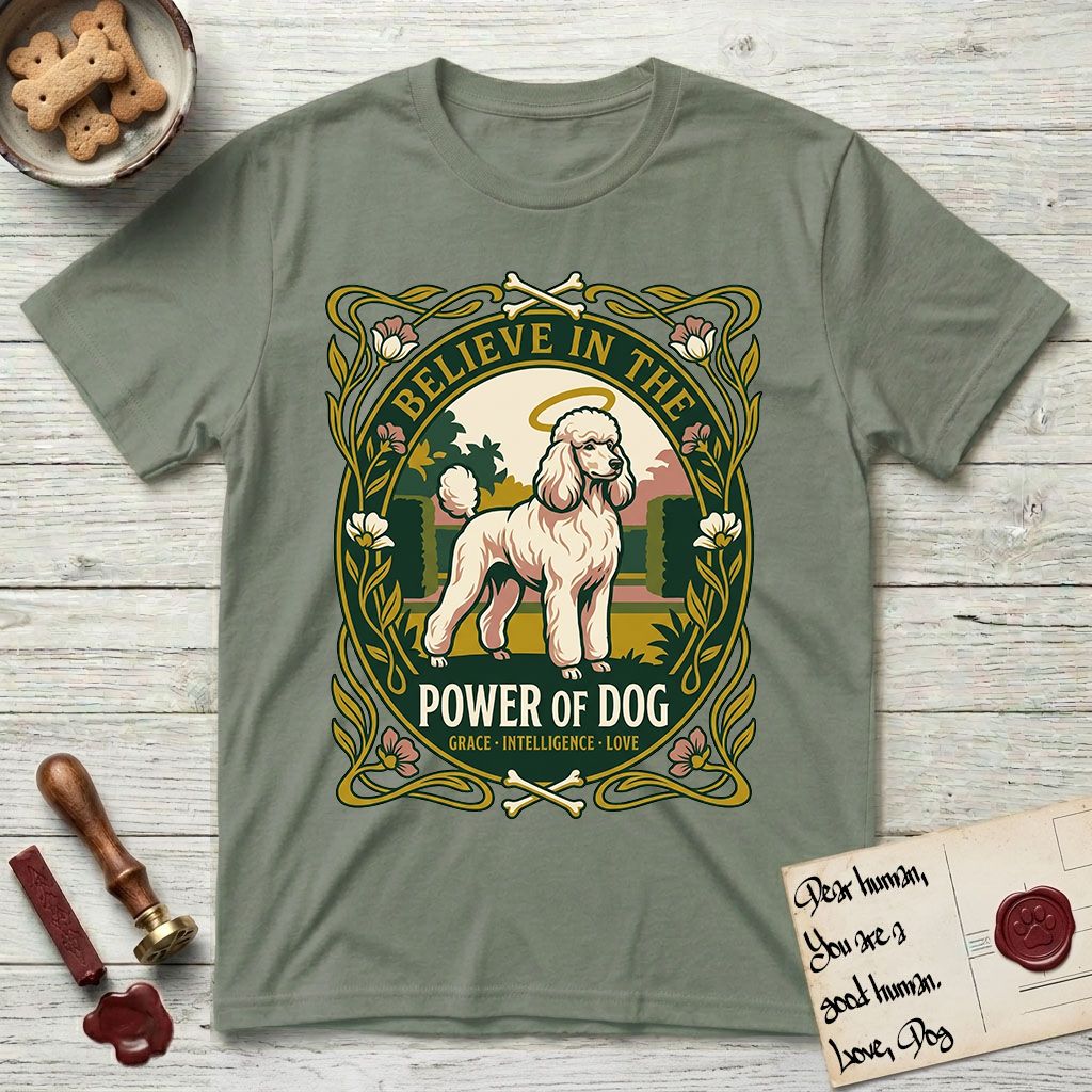 Believe in the Power of Dog Poodle T-Shirt flat lay in Sage, featuring an Art Nouveau floral badge with a haloed Poodle in a garden park scene and the words Grace, Intelligence, Love.