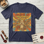 Believe in the Power of Dog Rescue Mutt T-Shirt flat lay in Navy, featuring a retro 1970s groovy poster of a grinning rescue mutt with a radiating sunburst and swirling florals.