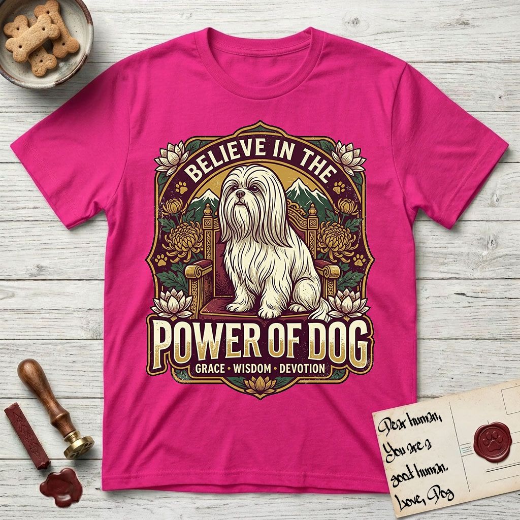 Believe in the Power of Dog Shih Tzu Throne T-Shirt flat lay in Heliconia, featuring an ornate dark badge with a Shih Tzu seated on a throne among chrysanthemums, lotus blossoms and mountain landscapes, and the words Grace, Wisdom, Devotion.