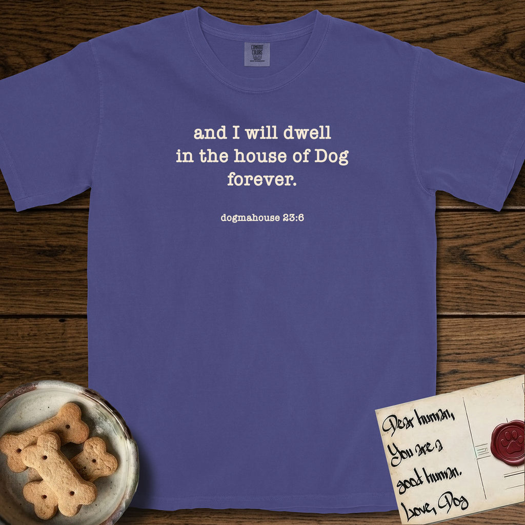And I Will Dwell T-Shirt flat lay in Grape, featuring Small centered typewriter-type text reading and I will dwell in the house of Dog forever, with the citation dogmahouse 23:6 beneath it.