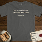 Dog is My Shepherd T-Shirt flat lay in Pepper, featuring Small centered typewriter-type text reading Dog is my shepherd; I shall not walk alone, with the citation dogmahouse 23:1 beneath it.