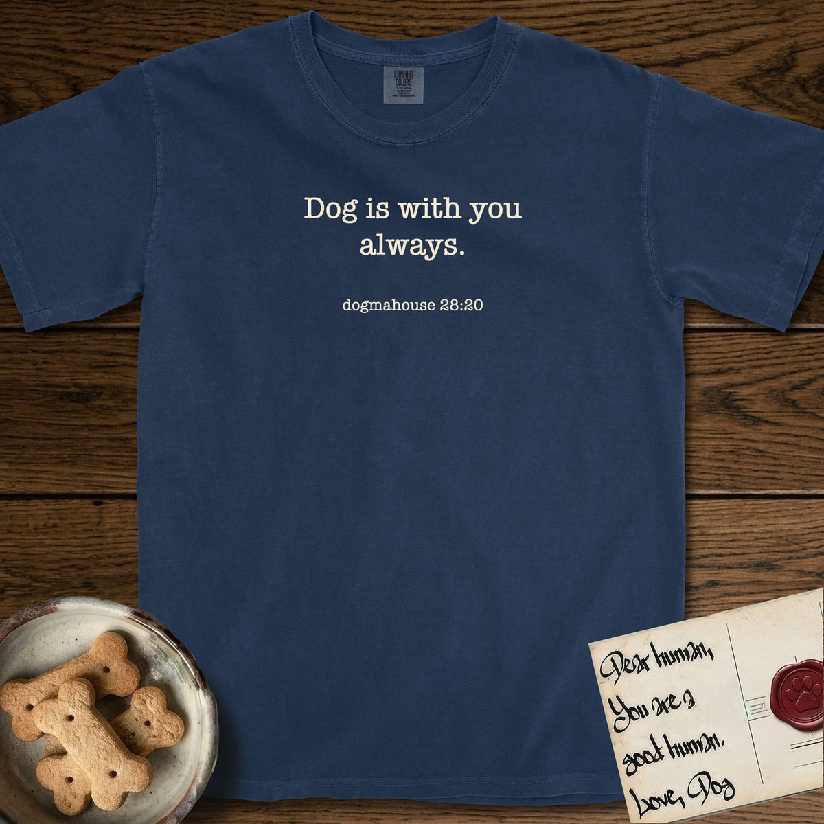 Dog is With You T-Shirt flat lay in True Navy, featuring Small centered typewriter-type text reading Dog is with you always, with the citation dogmahouse 28:20 beneath it.