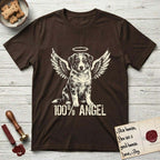 Australian Shepherd T-Shirt flat lay in Dark Chocolate, featuring Distressed cream one-color screen-print of a blue merle Australian Shepherd puppy as an angel, wings raised and a halo above, with 100% ANGEL lettering across the bottom.