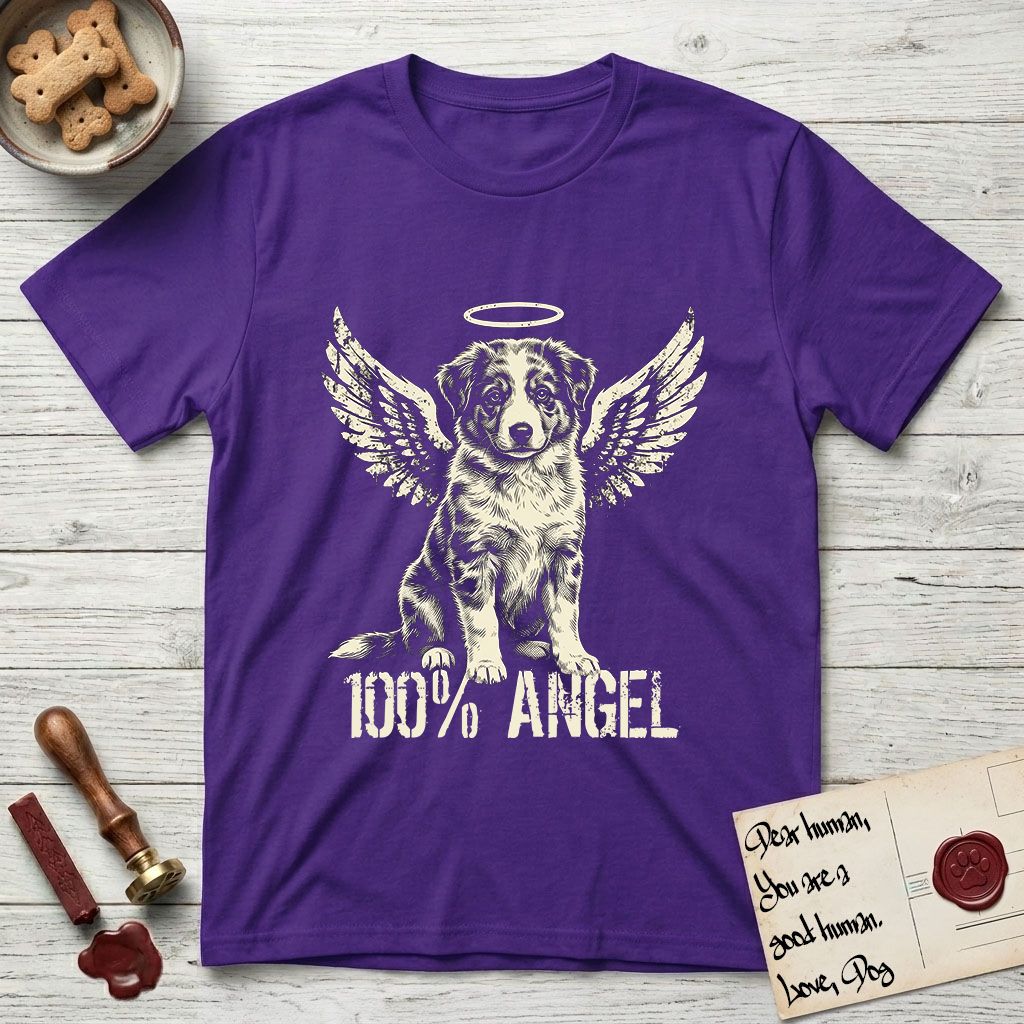 Australian Shepherd T-Shirt flat lay in Purple, featuring Distressed cream one-color screen-print of a blue merle Australian Shepherd puppy as an angel, wings raised and a halo above, with 100% ANGEL lettering across the bottom.
