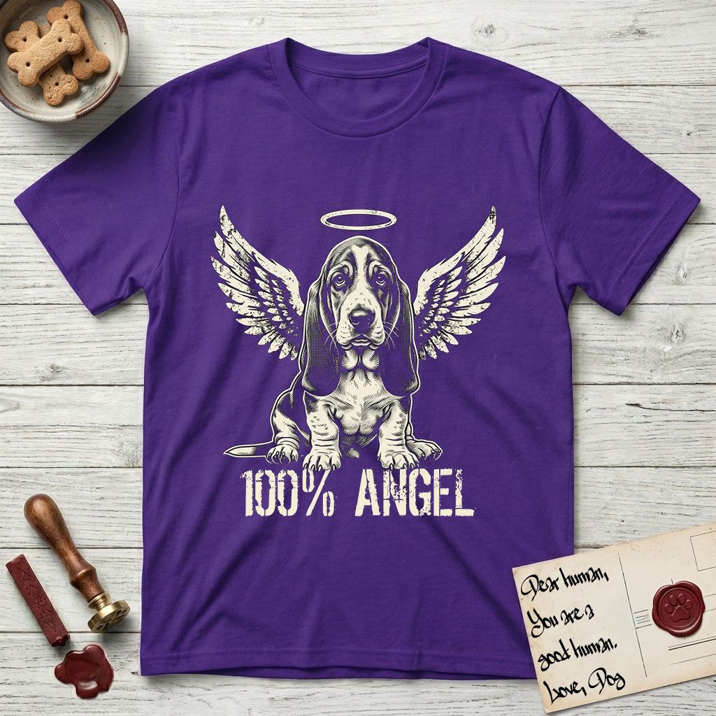 Basset Hound T-Shirt flat lay in Purple, featuring Distressed cream one-color screen-print of a Basset Hound puppy as an angel, long ears draping forward, wings spread and a halo above, with 100% ANGEL lettering across the bottom.