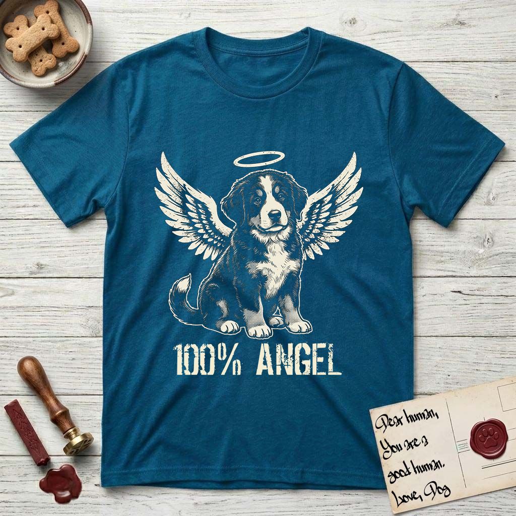 Bernese Mountain Dog T-Shirt flat lay in Antique Sapphire, featuring Distressed cream one-color screen-print of a Bernese Mountain Dog puppy as an angel, three-quarter sitting pose with bushy tail curled, wings spread and a halo above, with 100% ANGEL lettering across the bottom.