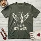 Bernese Mountain Dog T-Shirt flat lay in Heather Military Green, featuring Distressed cream one-color screen-print of a Bernese Mountain Dog puppy as an angel, three-quarter sitting pose with bushy tail curled, wings spread and a halo above, with 100% ANGEL lettering across the bottom.
