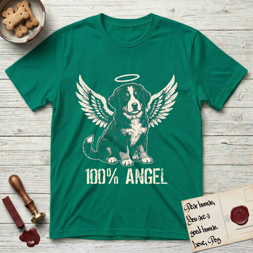 Bernese Mountain Dog T-Shirt flat lay in Kelly Green, featuring Distressed cream one-color screen-print of a Bernese Mountain Dog puppy as an angel, three-quarter sitting pose with bushy tail curled, wings spread and a halo above, with 100% ANGEL lettering across the bottom.