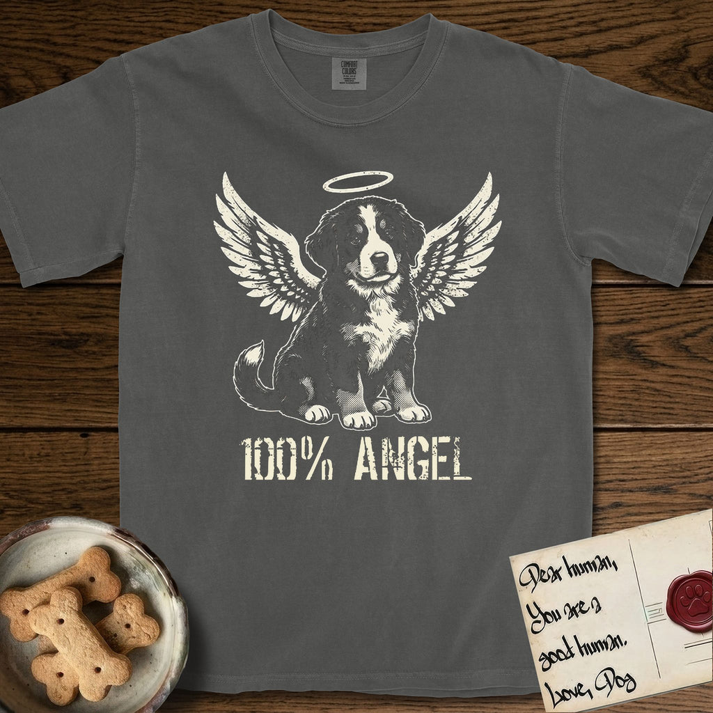 Bernese Mountain Dog T-Shirt flat lay in Pepper, featuring Distressed cream one-color screen-print of a Bernese Mountain Dog puppy as an angel, three-quarter sitting pose with bushy tail curled, wings spread and a halo above, with 100% ANGEL lettering across the bottom.