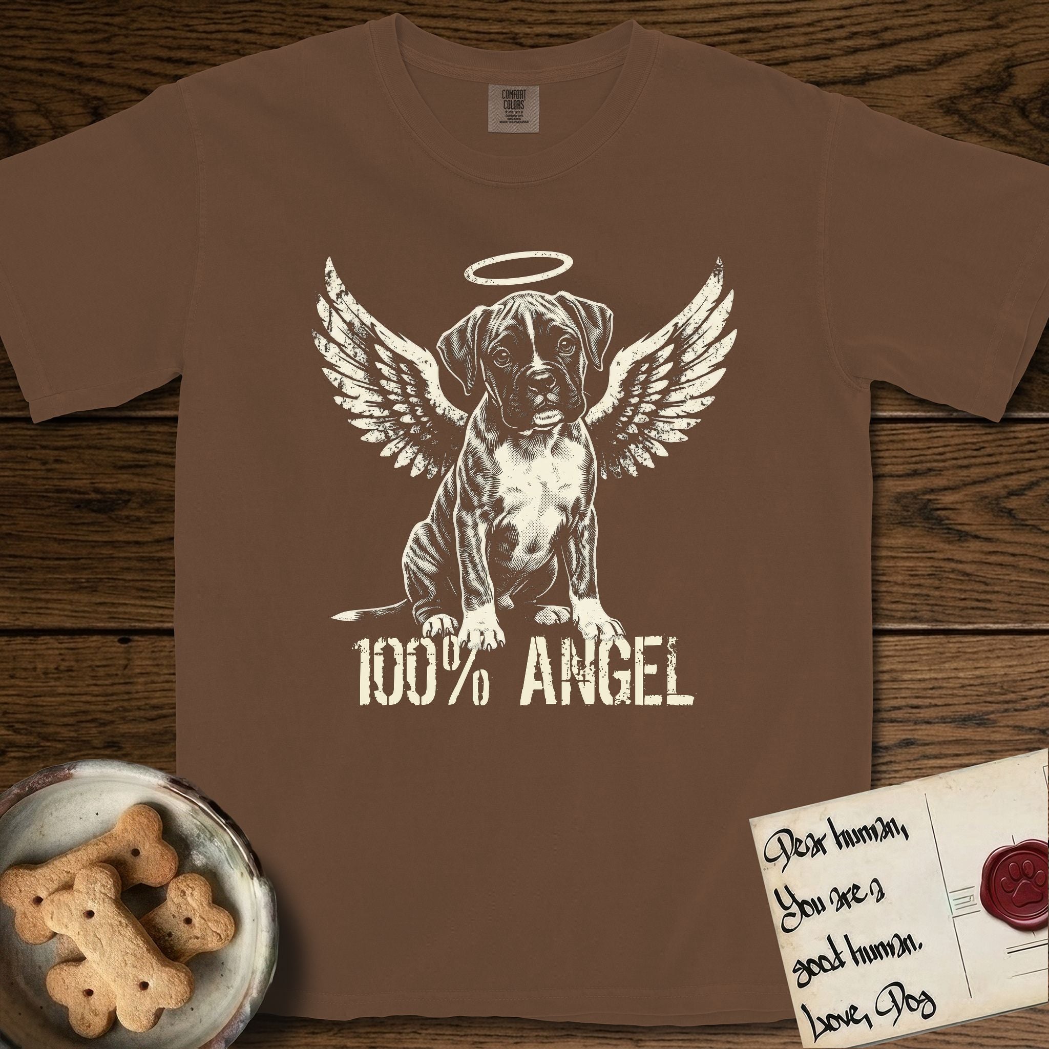 Boxer T-Shirt flat lay in Espresso, featuring Distressed cream one-color screen-print of a Boxer puppy as an angel, wrinkly face with a slight head tilt, wings spread and a halo above, with 100% ANGEL lettering across the bottom.