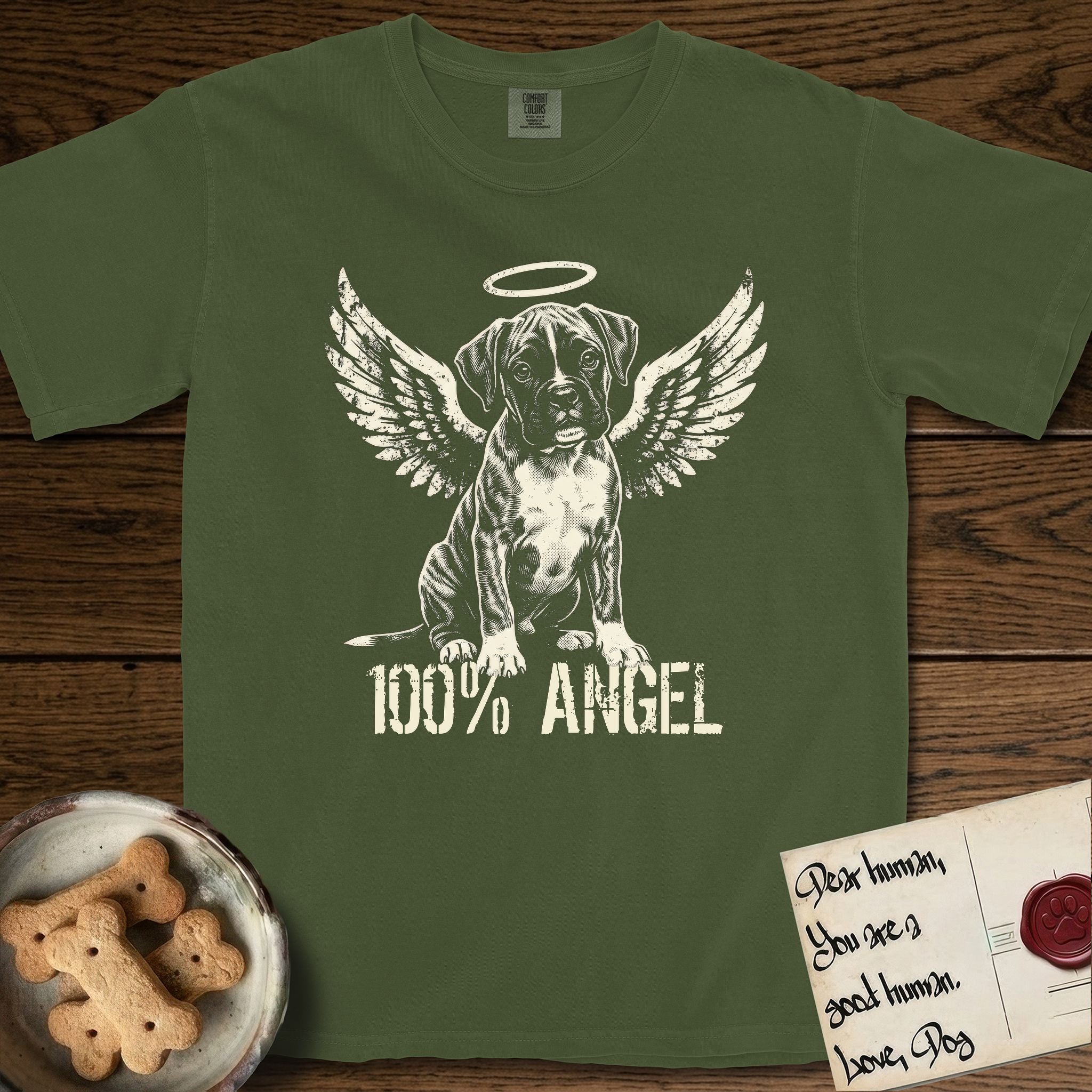 Boxer T-Shirt flat lay in Hemp, featuring Distressed cream one-color screen-print of a Boxer puppy as an angel, wrinkly face with a slight head tilt, wings spread and a halo above, with 100% ANGEL lettering across the bottom.