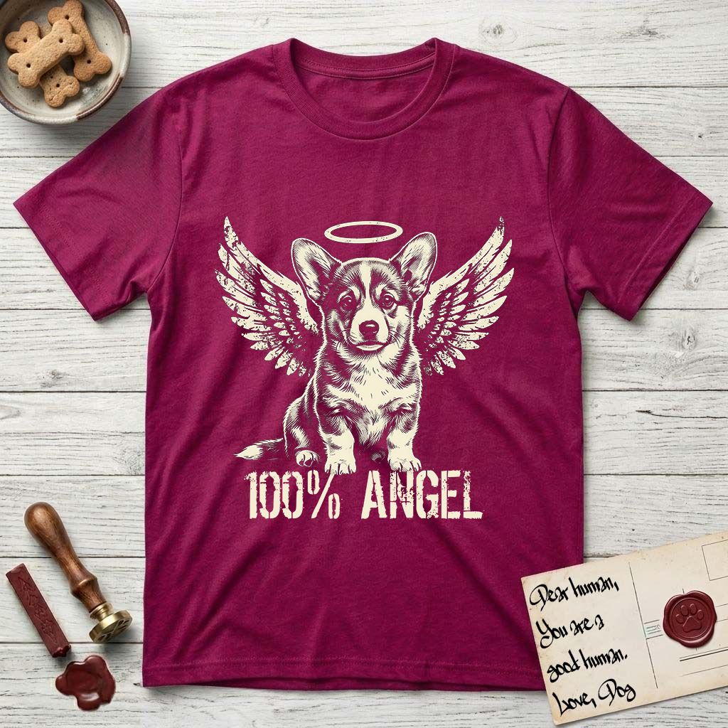 Corgi T-Shirt flat lay in Antique Heliconia, featuring Distressed cream one-color screen-print of a Pembroke Welsh Corgi puppy as an angel, big erect ears and short legs, wings spread and a halo above, with 100% ANGEL lettering across the bottom.