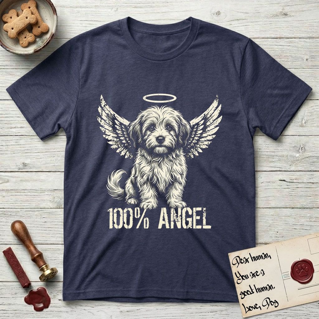 Coton de Tulear T-Shirt flat lay in Navy, featuring Distressed cream one-color screen-print of a fluffy white Coton de Tulear puppy as an angel, plumed tail curled beside him, wings spread and a halo above, with 100% ANGEL lettering across the bottom.