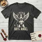 Lobo T-Shirt flat lay in Charcoal, featuring Distressed cream one-color screen-print of a black-and-white Australian Cattle Dog and Pitbull mix puppy as an angel, big upright ears with one tip folded, wings spread and a halo above, with 100% ANGEL lettering across the bottom.