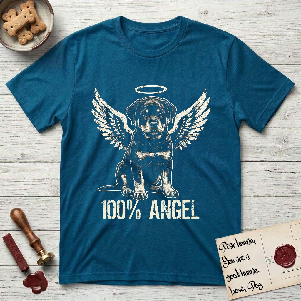 Rottweiler T-Shirt flat lay in Antique Sapphire, featuring Distressed cream one-color screen-print of a Rottweiler puppy as an angel, sitting square and sturdy, wings spread and a halo above, with 100% ANGEL lettering across the bottom.