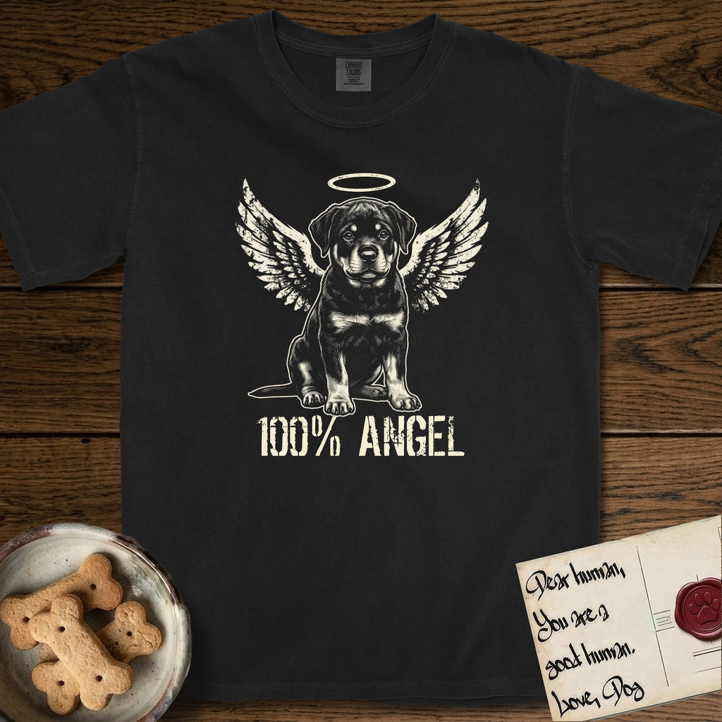 Rottweiler T-Shirt flat lay in Black, featuring Distressed cream one-color screen-print of a Rottweiler puppy as an angel, sitting square and sturdy, wings spread and a halo above, with 100% ANGEL lettering across the bottom.