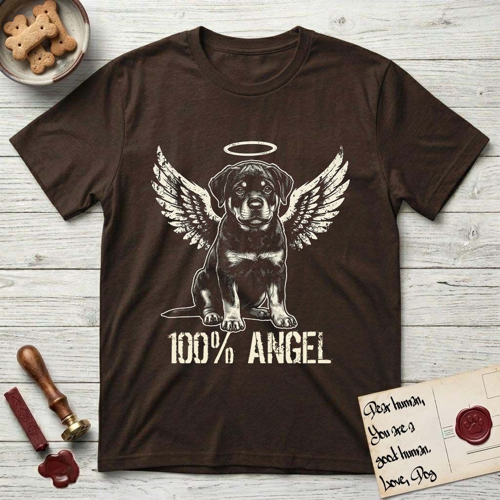 Rottweiler T-Shirt flat lay in Dark Chocolate, featuring Distressed cream one-color screen-print of a Rottweiler puppy as an angel, sitting square and sturdy, wings spread and a halo above, with 100% ANGEL lettering across the bottom.