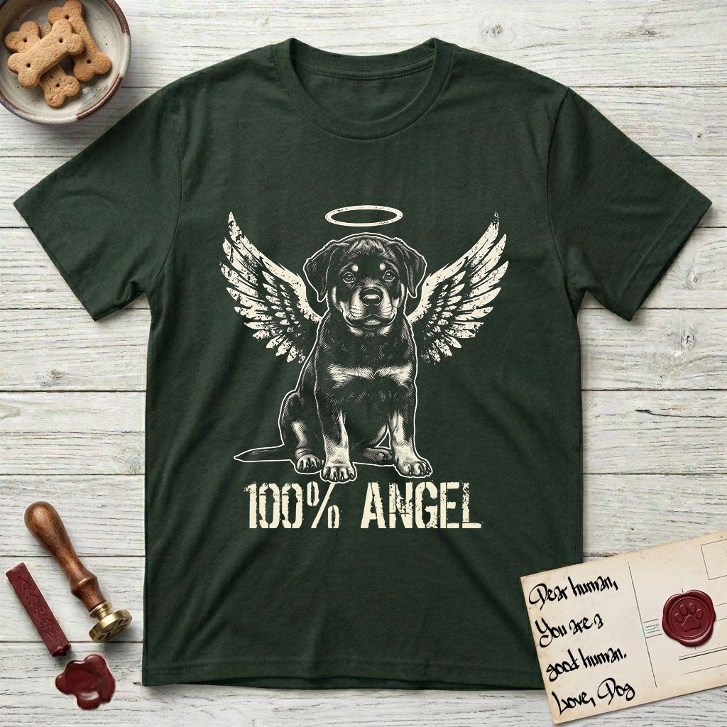 Rottweiler T-Shirt flat lay in Forest Green, featuring Distressed cream one-color screen-print of a Rottweiler puppy as an angel, sitting square and sturdy, wings spread and a halo above, with 100% ANGEL lettering across the bottom.