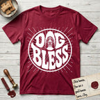 Dog Bless Basset Hound T-Shirt flat lay in Antique Cherry Red, featuring Retro bubble-letter badge reading DOG BLESS with a long-eared Basset Hound face framed in the letter O, hand-drawn sunburst rays radiating outward.