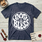 Dog Bless Chihuahua T-Shirt flat lay in Heather Navy, featuring Retro bubble-letter badge reading DOG BLESS with a wide-eyed Chihuahua face framed in the letter O, oversized ears reaching past the letter, hand-drawn sunburst rays radiating outward.