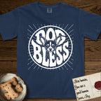 Dog Bless Chihuahua T-Shirt flat lay in True Navy, featuring Retro bubble-letter badge reading DOG BLESS with a wide-eyed Chihuahua face framed in the letter O, oversized ears reaching past the letter, hand-drawn sunburst rays radiating outward.
