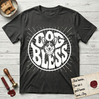 Dog Bless Corgi T-Shirt flat lay in Charcoal, featuring Retro bubble-letter badge reading DOG BLESS with a smiling Corgi face framed in the letter O, chest fluff spilling below the letter, hand-drawn sunburst rays radiating outward.