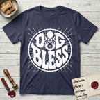 Dog Bless German Shepherd T-Shirt flat lay in Navy, featuring Retro bubble-letter badge reading DOG BLESS with a German Shepherd face with tall upright ears framed in the letter O, hand-drawn sunburst rays radiating outward.