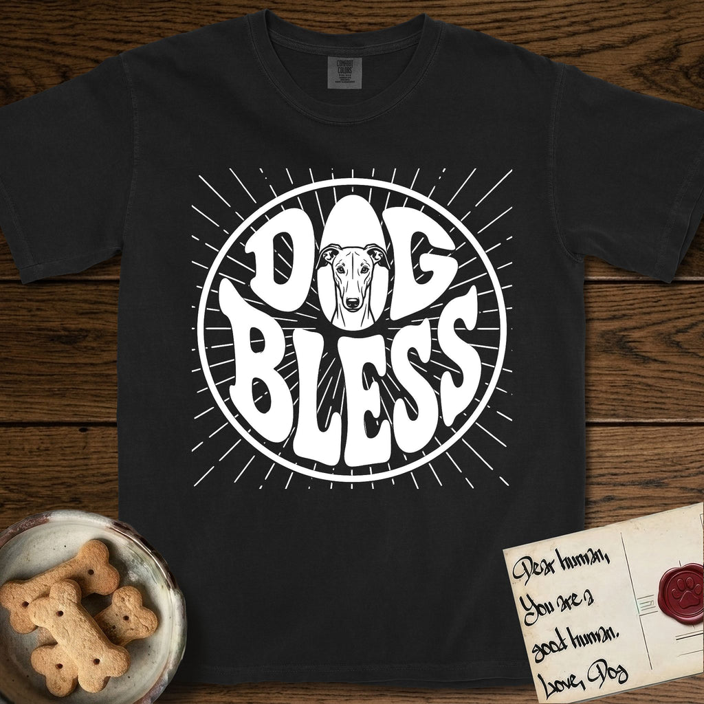 Dog Bless Greyhound T-Shirt flat lay in Black, featuring Retro bubble-letter badge reading DOG BLESS with a slender Greyhound face with folded rose ears framed in the letter O, hand-drawn sunburst rays radiating outward.