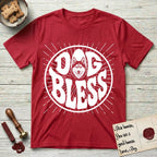 Dog Bless Husky T-Shirt flat lay in Cherry Red, featuring Retro bubble-letter badge reading DOG BLESS with a masked Husky face framed in the letter O, hand-drawn sunburst rays radiating outward.
