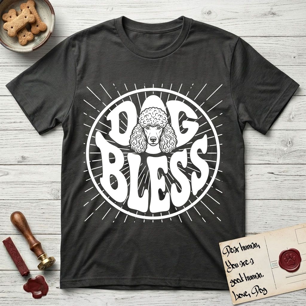 Dog Bless Poodle T-Shirt flat lay in Charcoal, featuring Retro bubble-letter badge reading DOG BLESS with a Poodle face with curly topknot and long curled ears framed in the letter O, hand-drawn sunburst rays radiating outward.