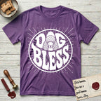 Dog Bless Poodle T-Shirt flat lay in Heather Purple, featuring Retro bubble-letter badge reading DOG BLESS with a Poodle face with curly topknot and long curled ears framed in the letter O, hand-drawn sunburst rays radiating outward.