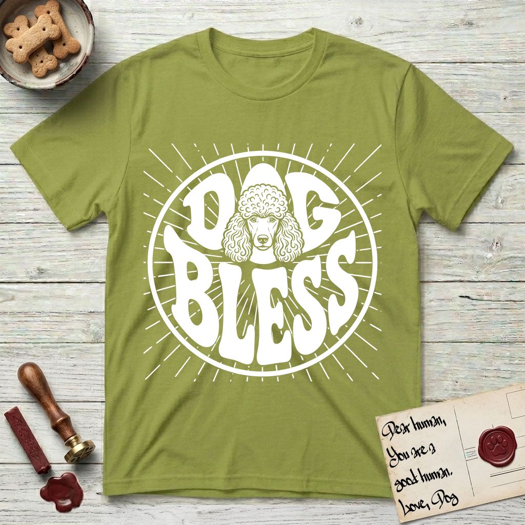 Dog Bless Poodle T-Shirt flat lay in Kiwi, featuring Retro bubble-letter badge reading DOG BLESS with a Poodle face with curly topknot and long curled ears framed in the letter O, hand-drawn sunburst rays radiating outward.